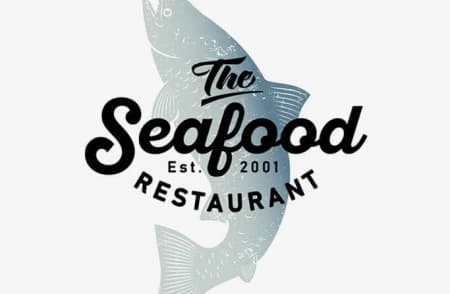 logo restauracji Seafood przedstawiające rybę oraz nazwę restauracji